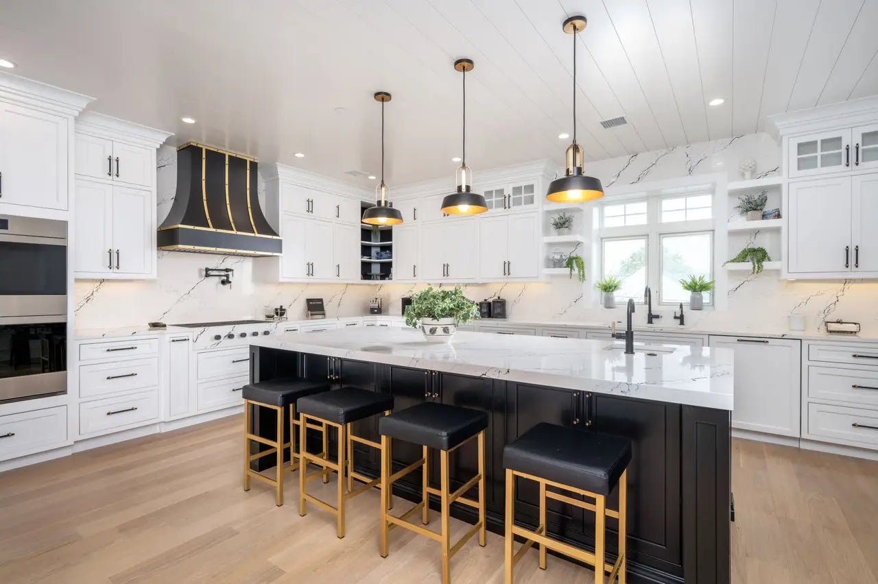 Inverness Platinum quartz kitchen island and perimeter countertops with white veining and polished finish — premium countertop fabrication by Signature Stone...
