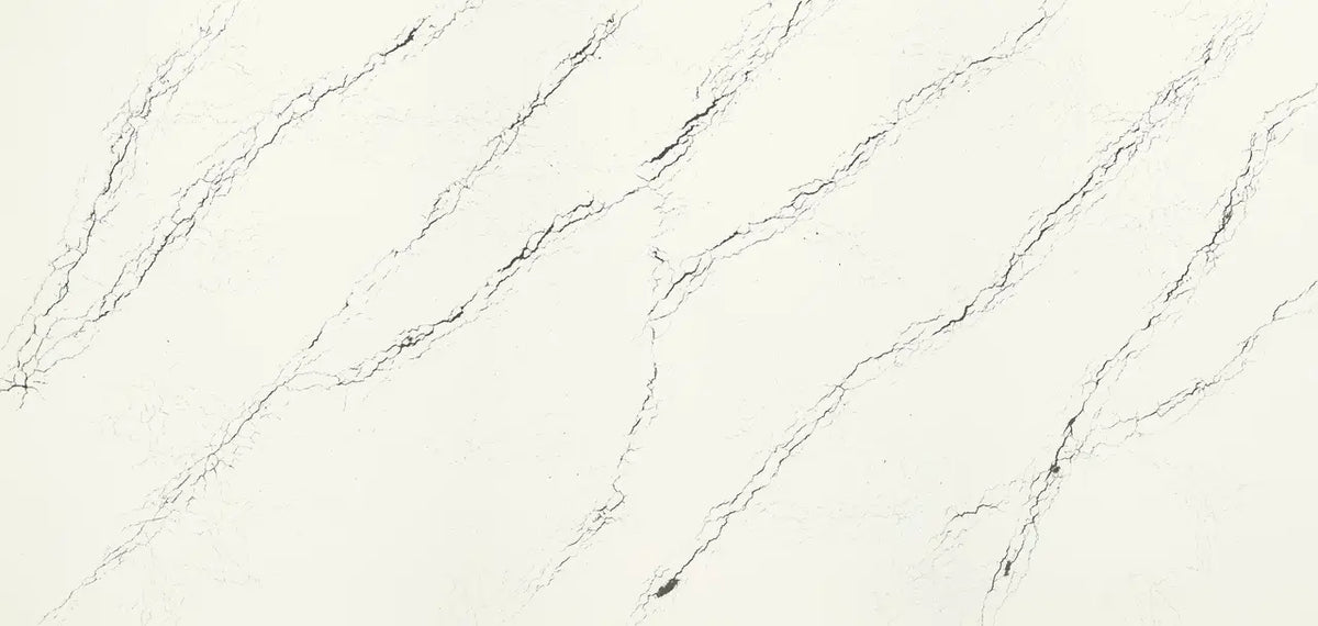 Quartz slab surface featuring elegant white base with gray diagonal veining and polished finish — premium stone countertops installed by Signature Stone Las ...
