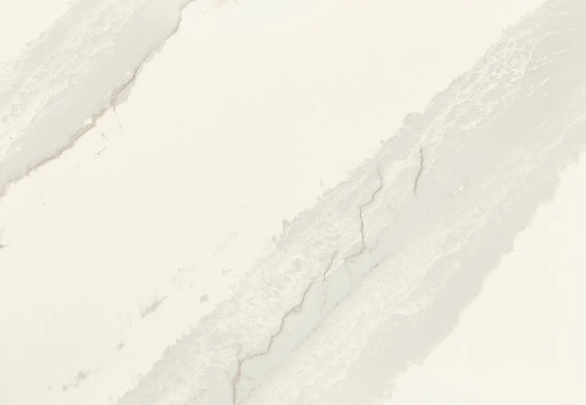 Quartz Inverness Swansea slab with soft white background and subtle gray veining — custom countertops fabricated and installed by Signature Stone LV