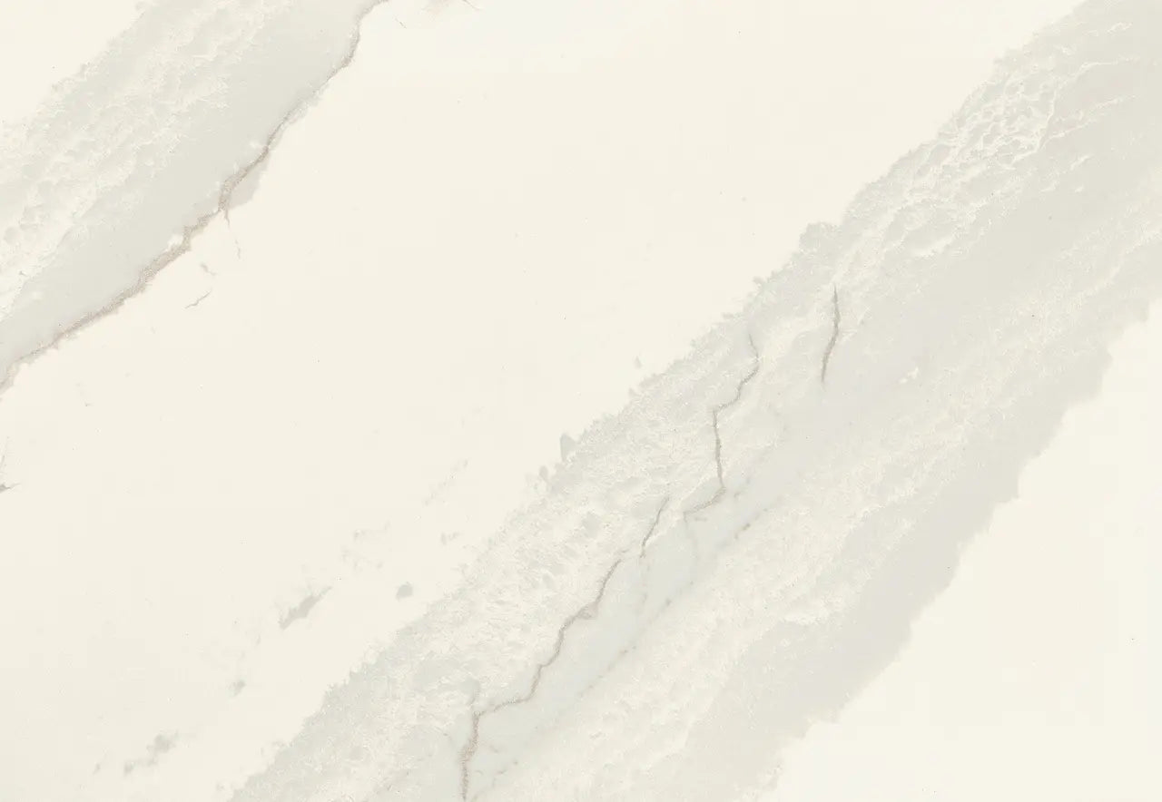 Quartz Inverness Swansea slab with soft white background and subtle gray veining — custom countertops fabricated and installed by Signature Stone LV
