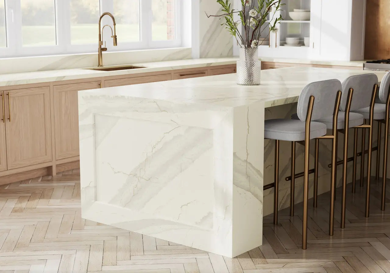 Inverness Swansea quartz kitchen island with white marble veining and waterfall edge — elegant stone countertops installed by Signature Stone Las Vegas