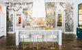 Ironsbridge kitchen island with white marble surface and curved edges — elegant stone countertops installed by Signature Stone Las Vegas