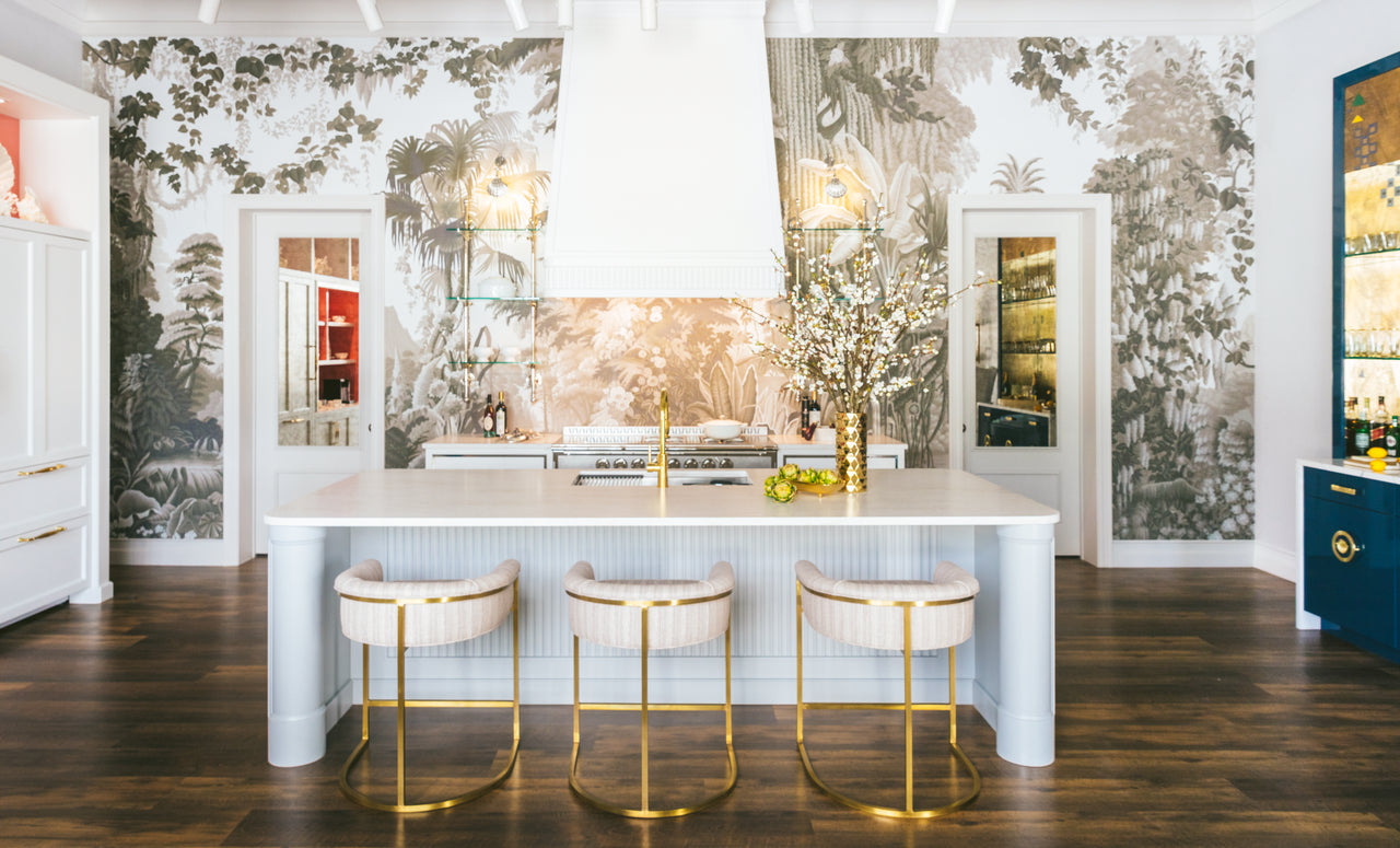 Ironsbridge kitchen island with white marble surface and curved edges — elegant stone countertops installed by Signature Stone Las Vegas