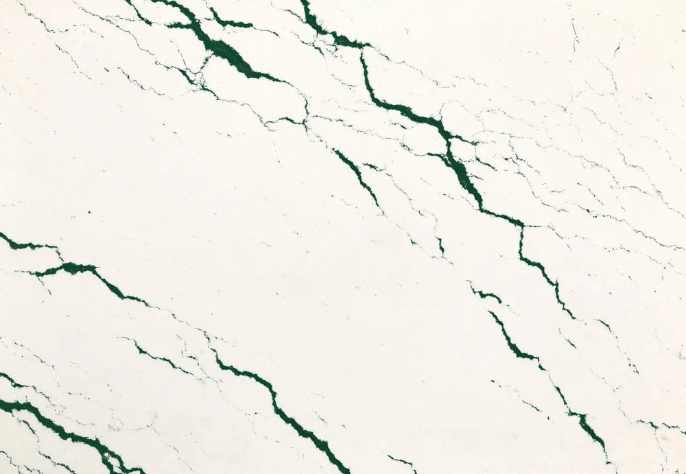 Ivybridge quartz slab with creamy white base and bold green veining — elegant stone countertops installed by Signature Stone Las Vegas