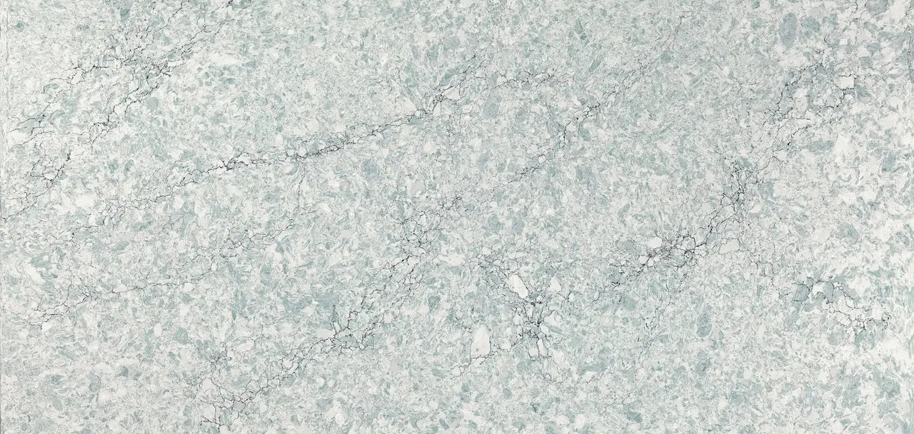 Kendal stone surface with light gray and green marbled veining and natural finish — ideal for custom countertops fabricated and installed by Signature Stone LV