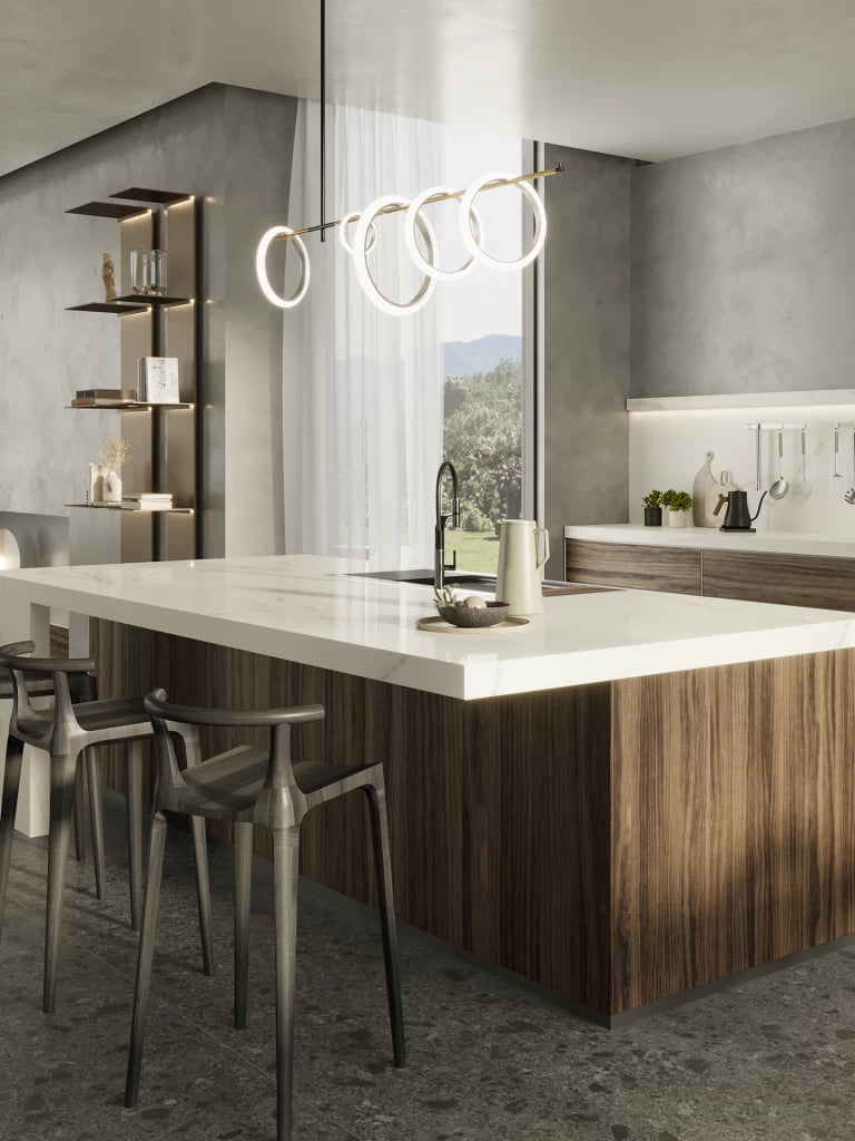 Calacatta Apuano kitchen island with white veined marble surface and waterfall edge — custom countertops fabricated and installed by Signature Stone LV