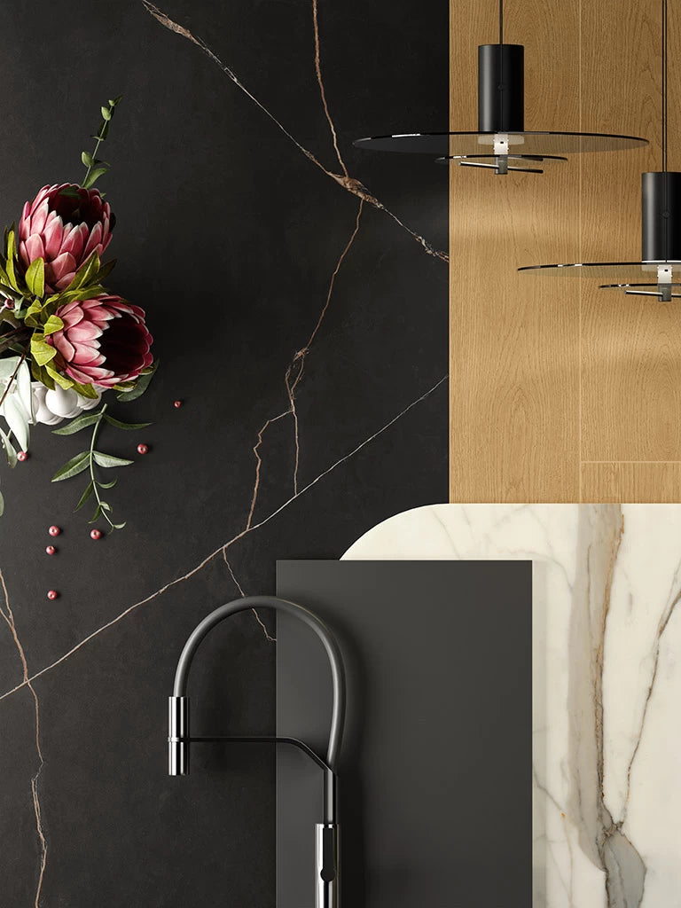 Black Atlantis marble kitchen countertop with white veining and modern black fixtures — premium stone countertops installed by Signature Stone Las Vegas