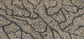 Langdon natural stone surface with beige background and dark gray veining pattern — premium stone countertops installed by Signature Stone Las Vegas