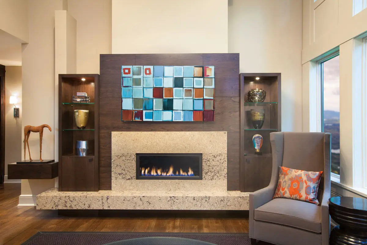 Quartz fireplace surround with speckled beige finish and clean linear edges — expert countertop fabrication by Signature Stone Las Vegas