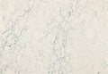 Mackworth quartz surface with soft white background and delicate gray veining — custom countertops fabricated and installed by Signature Stone LV