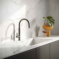 Calacatta marble kitchen countertop with white background and gold veining — premium stone countertops installed by Signature Stone Las Vegas