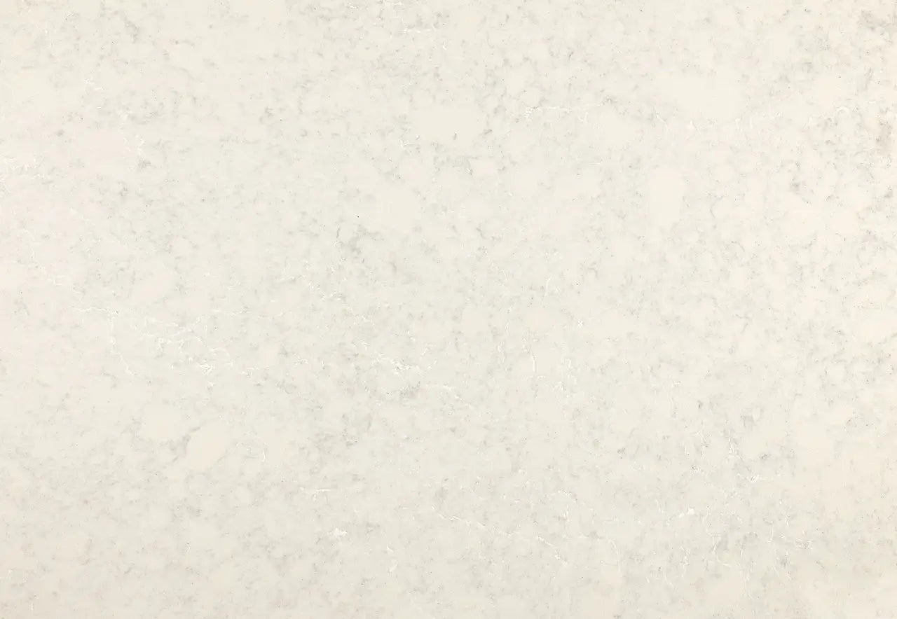 Malvern quartz kitchen countertop with light cream background and subtle veining — premium countertop fabrication by Signature Stone Las Vegas