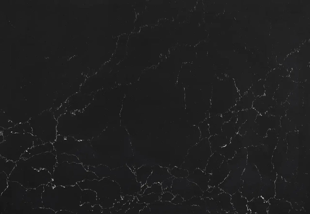 Mammoth Cave quartz surface with deep black background and white veining pattern — custom countertops fabricated and installed by Signature Stone LV