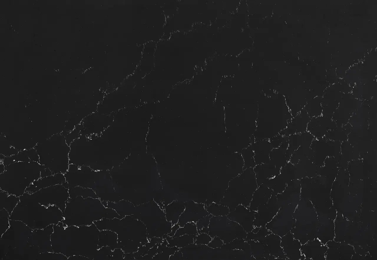 Mammoth Cave quartz surface with deep black background and white veining pattern — custom countertops fabricated and installed by Signature Stone LV