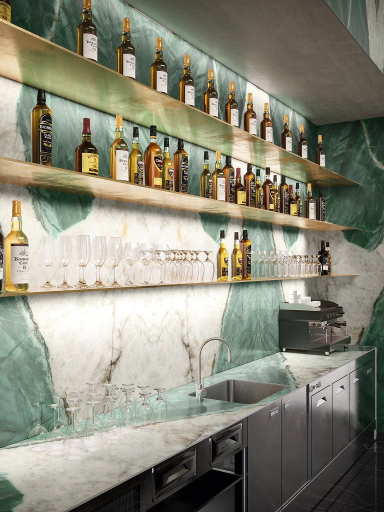 Exotic Wave stone bar featuring striking green and white veining with floating shelves — custom countertops fabricated and installed by Signature Stone LV