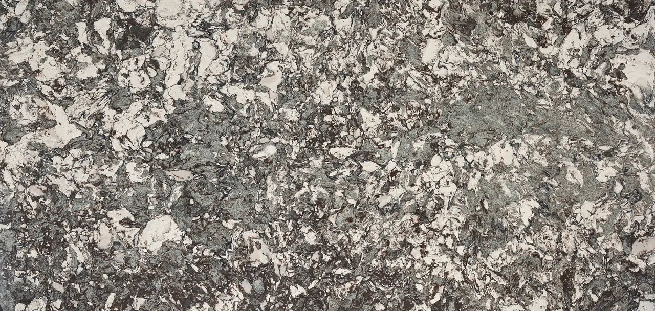 Marwell stone surface showcasing intricate gray and cream marbled patterns with natural veining — perfect for custom countertops fabricated and installed by ...