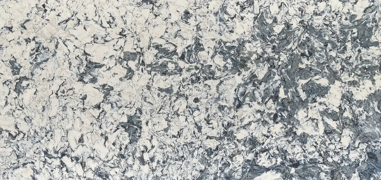 Granite surface with intricate gray and cream marbled veining and polished finish — premium countertop fabrication by Signature Stone Las Vegas