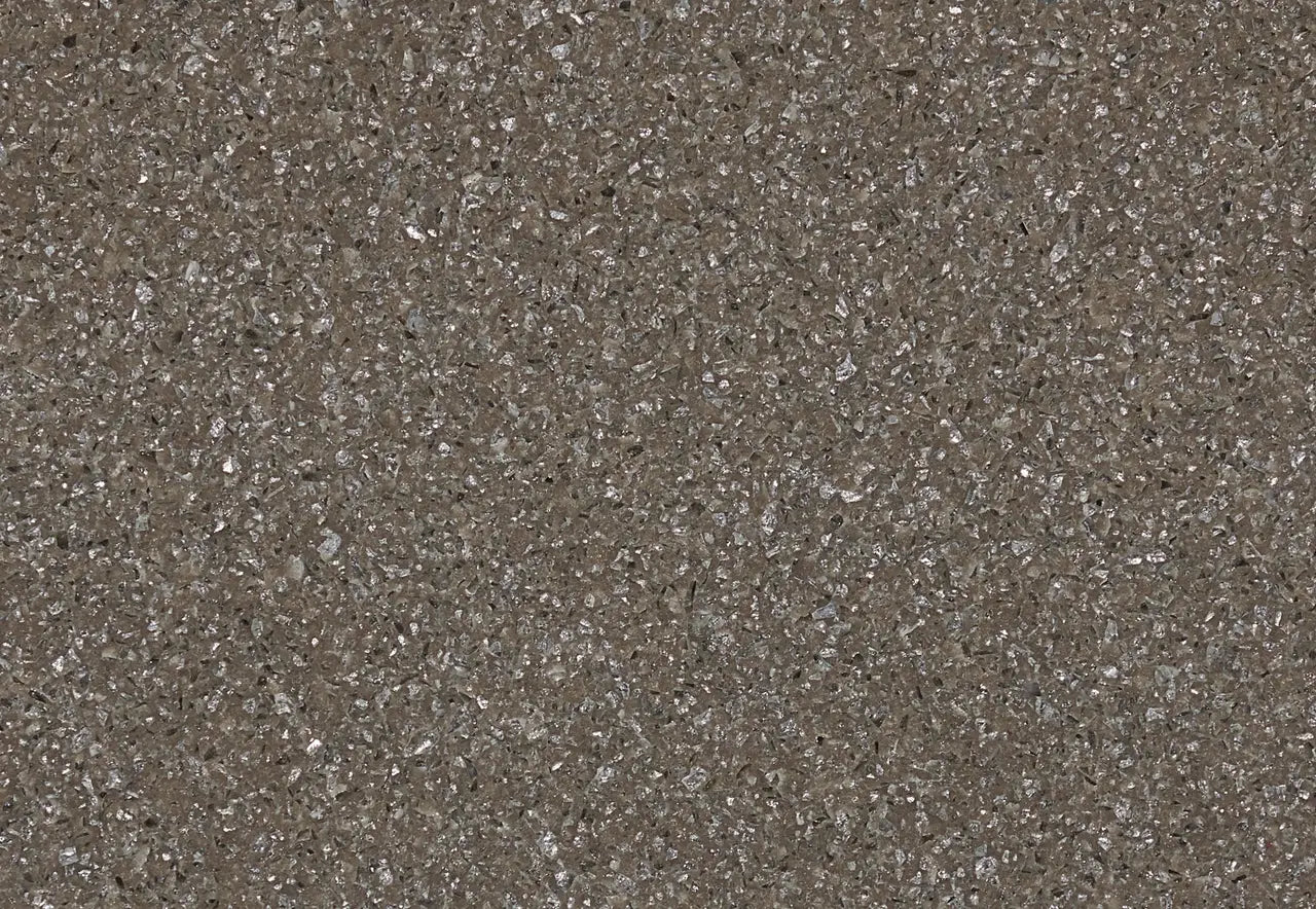 Minera quartz surface with speckled brown and gray pattern and polished finish — ideal for custom countertops fabricated and installed by Signature Stone LV