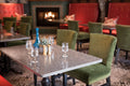 Minera stone restaurant table with speckled gray finish and polished surface — premium stone countertops installed by Signature Stone Las Vegas