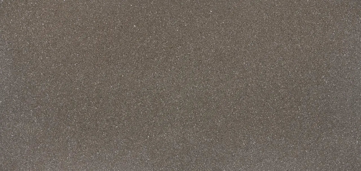 Minera quartz surface featuring warm taupe finish with subtle sparkle pattern — premium countertop fabrication by Signature Stone Las Vegas