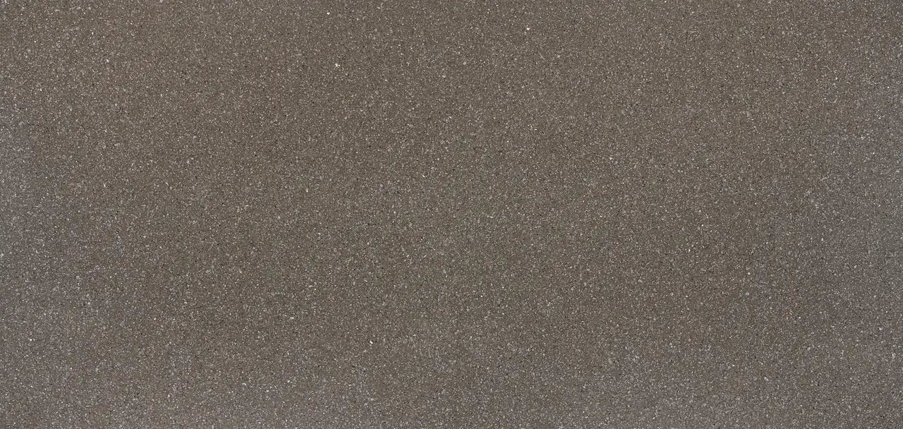 Minera quartz surface featuring warm taupe finish with subtle sparkle pattern — premium countertop fabrication by Signature Stone Las Vegas