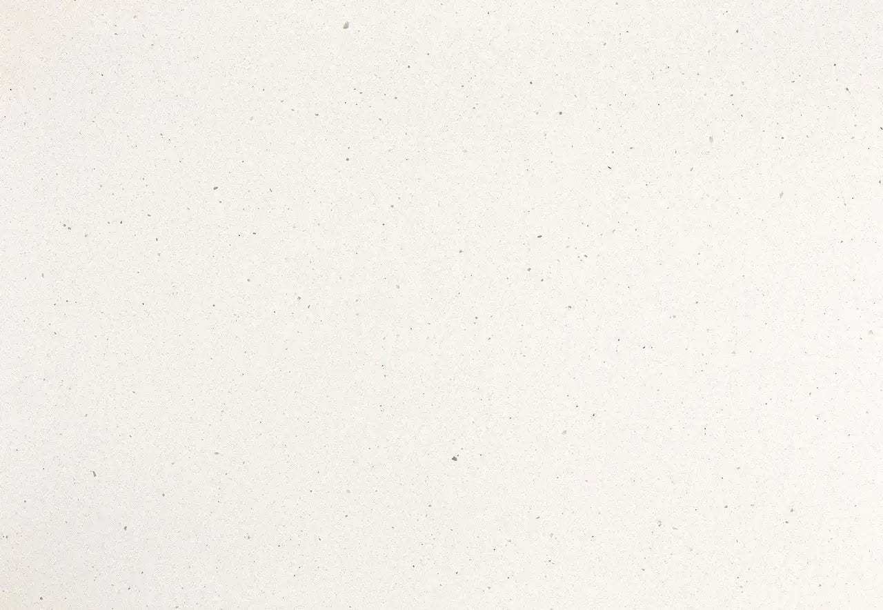 Minnesota Snow quartz surface with clean white finish and subtle speckled pattern — premium stone countertops installed by Signature Stone Las Vegas