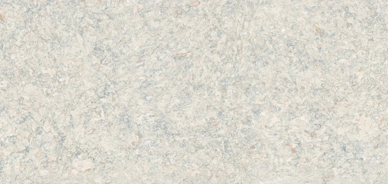 Montgomery quartz surface with soft beige and gray marbled patterns and smooth polished finish — premium countertop fabrication by Signature Stone Las Vegas