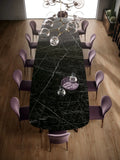 Nero Marquina dining table with dramatic black marble and white veining — elegant stone countertops installed by Signature Stone Las Vegas