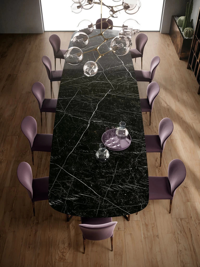 Nero Marquina dining table with dramatic black marble and white veining — elegant stone countertops installed by Signature Stone Las Vegas