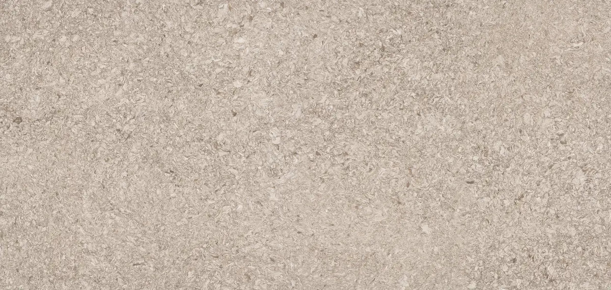 New Quay quartz surface with warm beige tones and subtle natural veining — custom countertops fabricated and installed by Signature Stone LV