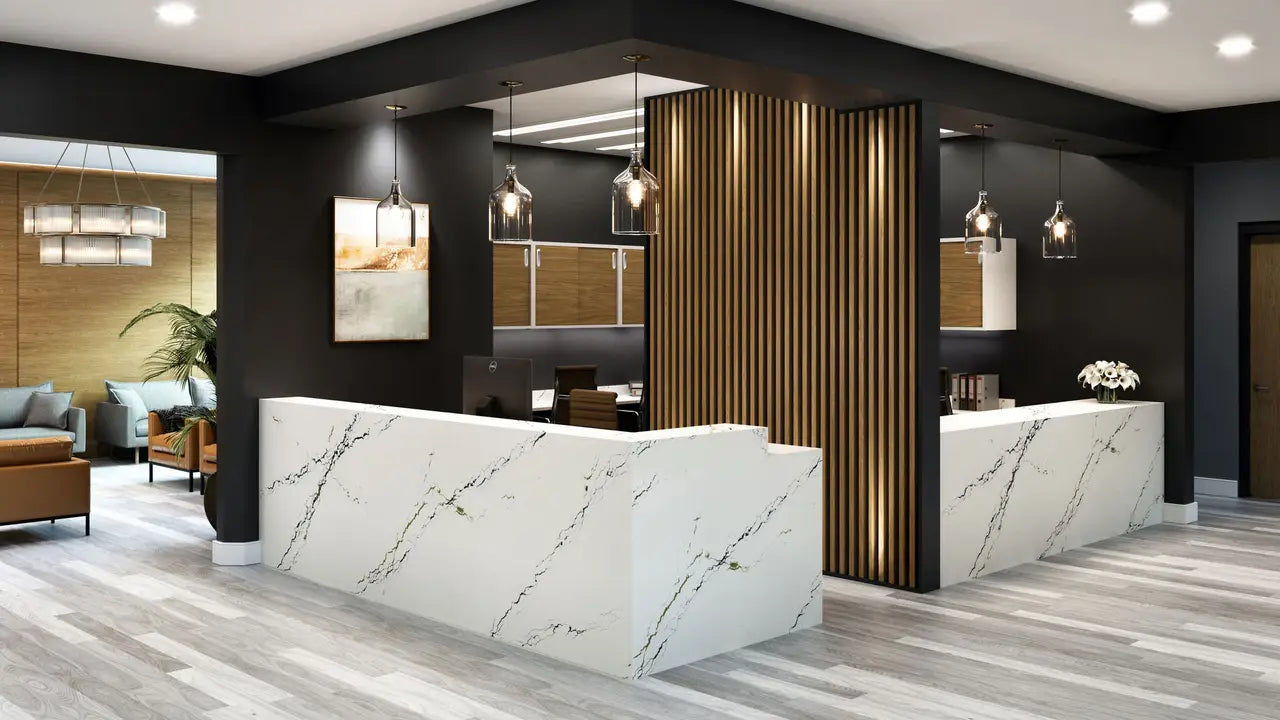Quartz reception desk with white marble veining and modern angular design — premium countertop fabrication by Signature Stone Las Vegas