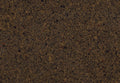 Quartz Park Gate slab with rich brown base and multicolored speckled pattern — premium stone countertops installed by Signature Stone Las Vegas
