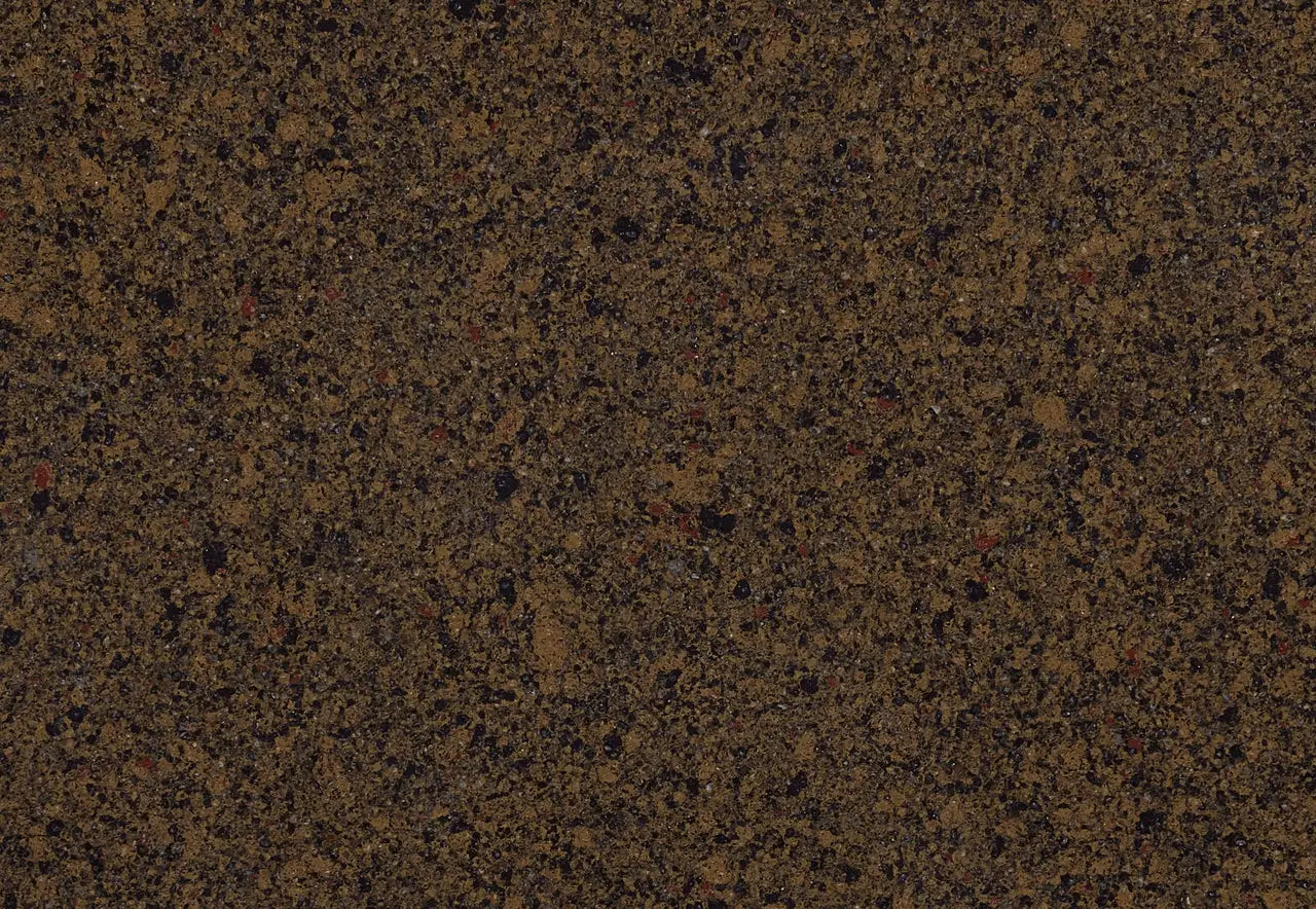 Quartz Park Gate slab with rich brown base and multicolored speckled pattern — premium stone countertops installed by Signature Stone Las Vegas