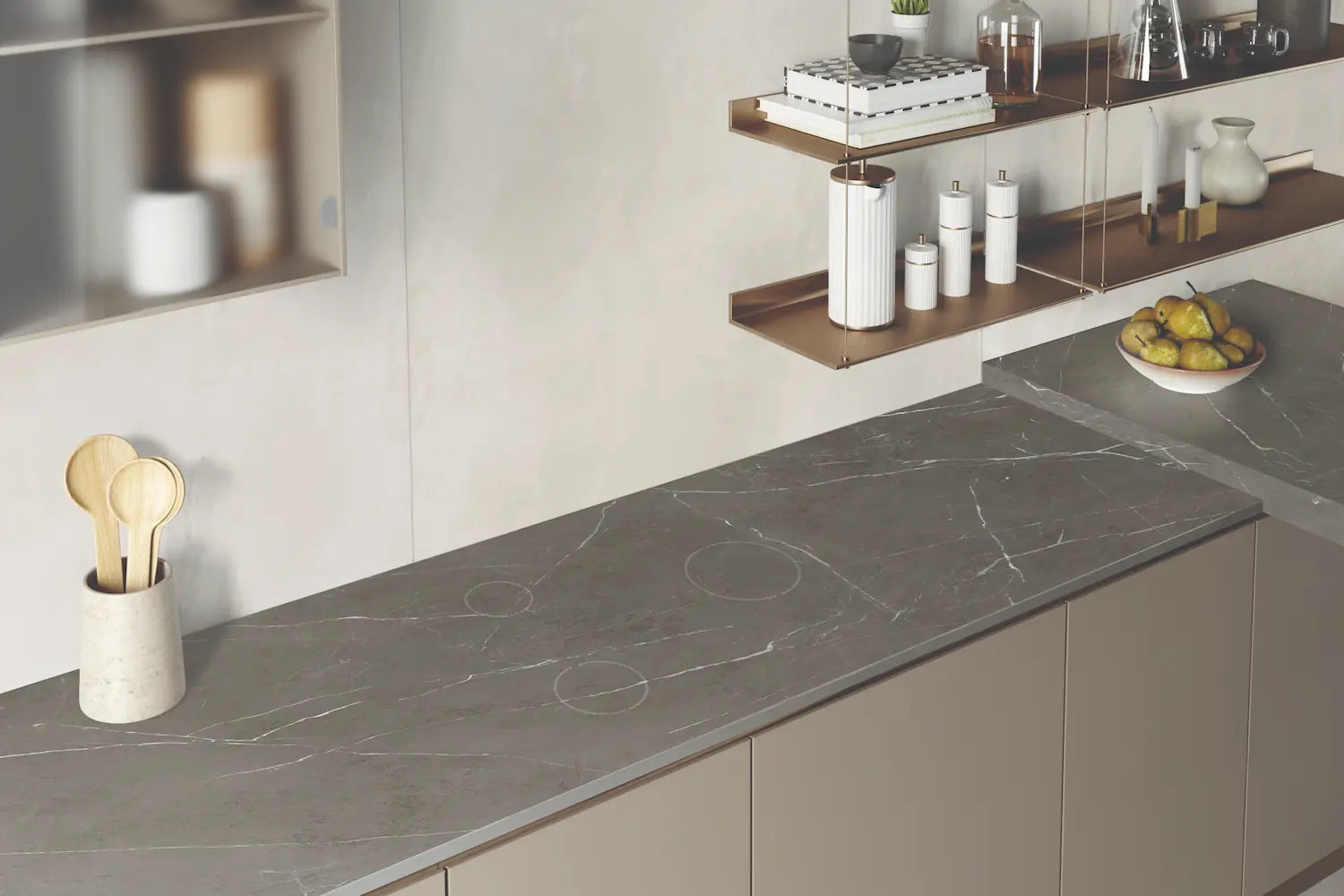 Pietra Grigio kitchen countertops with dark marble veining and induction cooktop — elegant stone countertops installed by Signature Stone Las Vegas