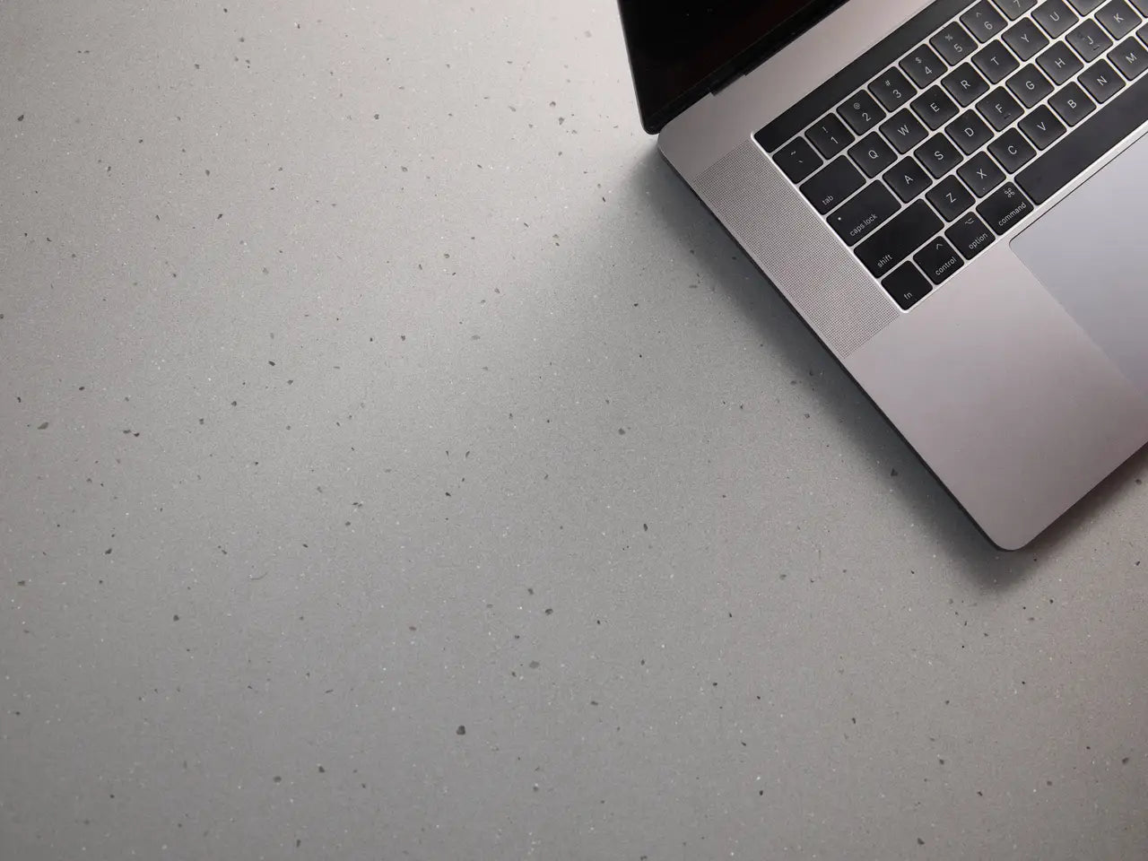 Quartz Pikes Peak surface with speckled gray pattern and smooth finish — premium countertop fabrication by Signature Stone Las Vegas