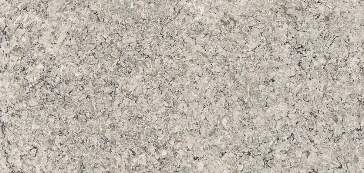Praa Sands granite surface with warm beige tones and intricate speckled pattern — premium countertop fabrication by Signature Stone Las Vegas