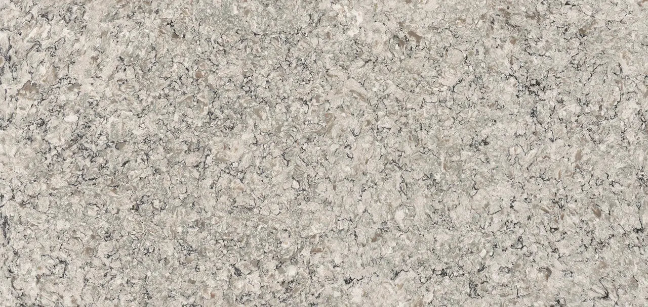 Praa Sands granite surface with warm beige tones and intricate speckled pattern — premium countertop fabrication by Signature Stone Las Vegas
