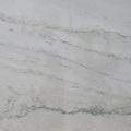 Quartzite Calacata surface with white background and gray veining — premium quartz countertops installed by Signature Stone Las Vegas