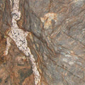 Quartzite Fusion slab surface showing dramatic gray and white veining with golden accents — quartz countertops installed by Signature Stone Las Vegas