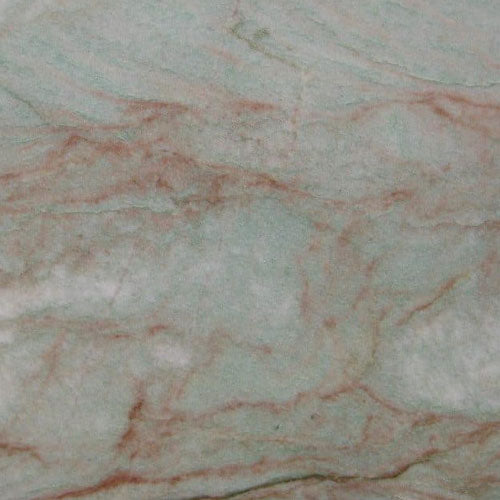 Quartzite Gaya surface with soft green and coral veining pattern — elegant quartz countertops installed by Signature Stone Las Vegas