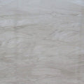 Quartzite Kalahari slab surface with light gray and white flowing veined pattern — premium quartz countertops installed by Signature Stone Las Vegas