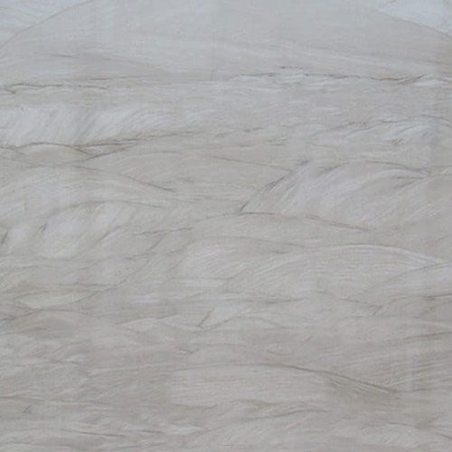 Quartzite Kalahari slab surface with light gray and white flowing veined pattern — premium quartz countertops installed by Signature Stone Las Vegas