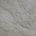 Quartzite Taj Mahal slab with soft white background and delicate gold veining — premium quartz countertops installed by Signature Stone Las Vegas