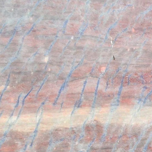 Quartzite Tycoon Blue slab surface with pink and blue veining patterns — premium quartz countertops installed by Signature Stone Las Vegas