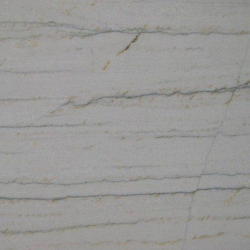 White Macaubas quartzite slab with soft gray veining and polished finish — elegant quartz countertops installed by Signature Stone Las Vegas