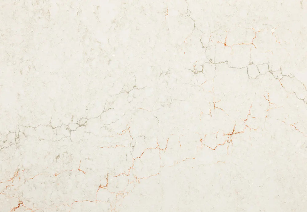 Marble slab with cream base and subtle coral-pink veining throughout polished surface — elegant stone countertops installed by Signature Stone Las Vegas