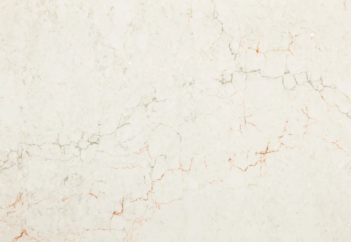 Marble slab with cream base and subtle coral-pink veining throughout polished surface — elegant stone countertops installed by Signature Stone Las Vegas