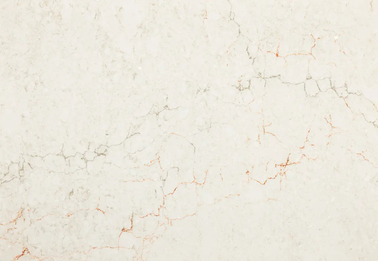 Marble slab with cream base and subtle coral-pink veining throughout polished surface — elegant stone countertops installed by Signature Stone Las Vegas