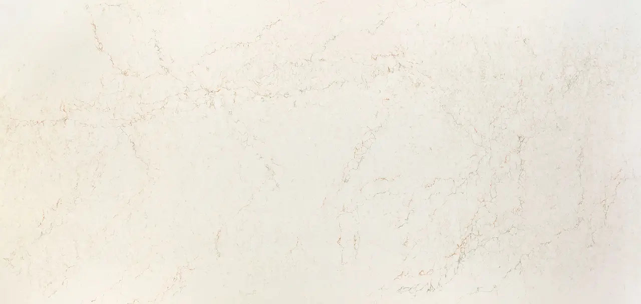 Quartz surface featuring subtle beige and cream veining with polished finish — premium countertop fabrication by Signature Stone Las Vegas
