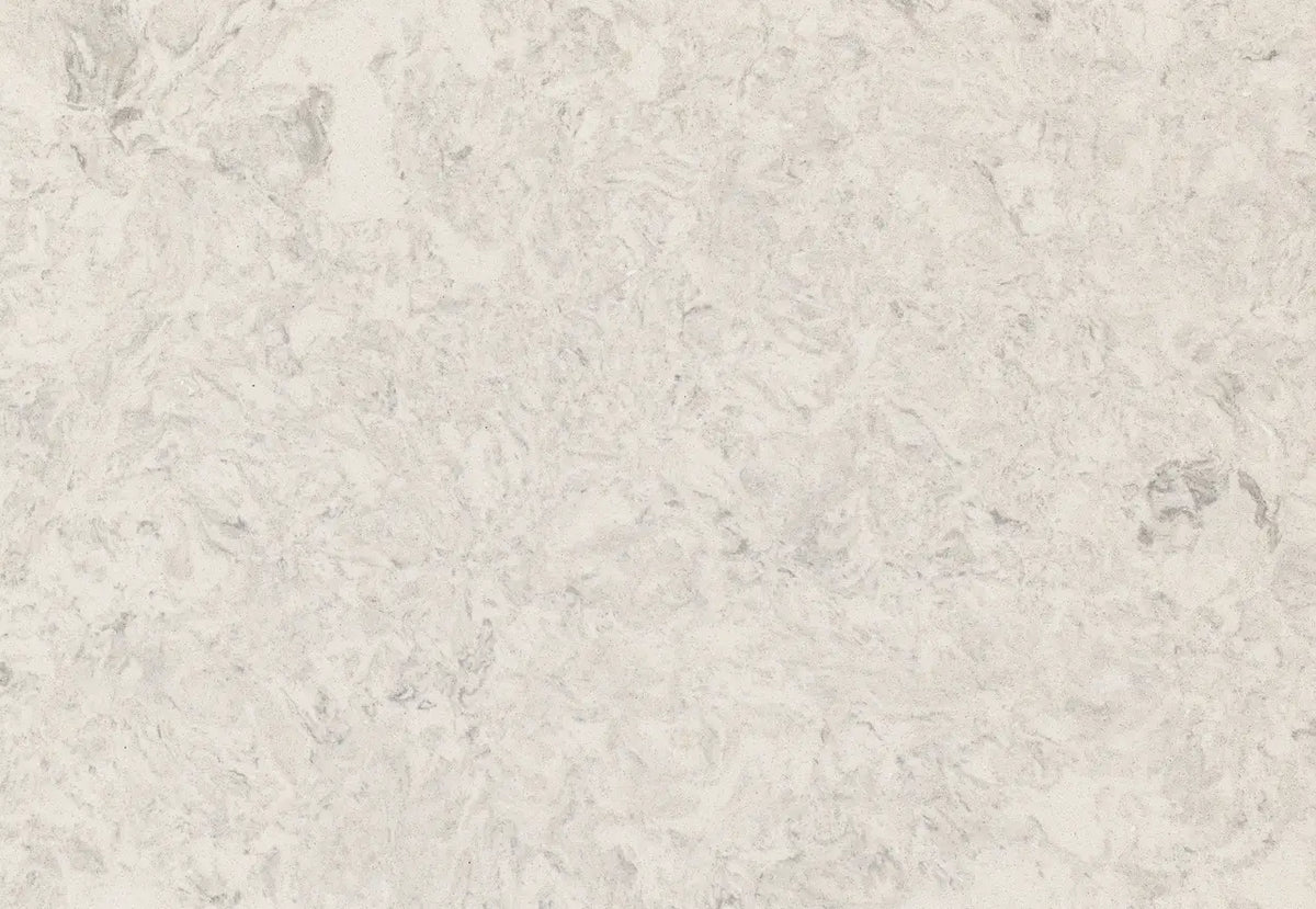 Risegate quartz surface with soft beige tones and subtle veining patterns — custom countertops fabricated and installed by Signature Stone LV